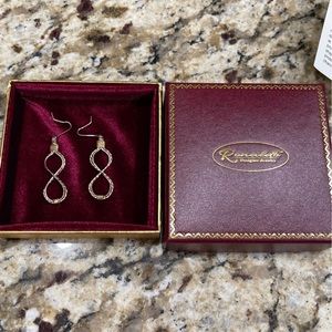 Ronaldo “Braided together for life” earrings.